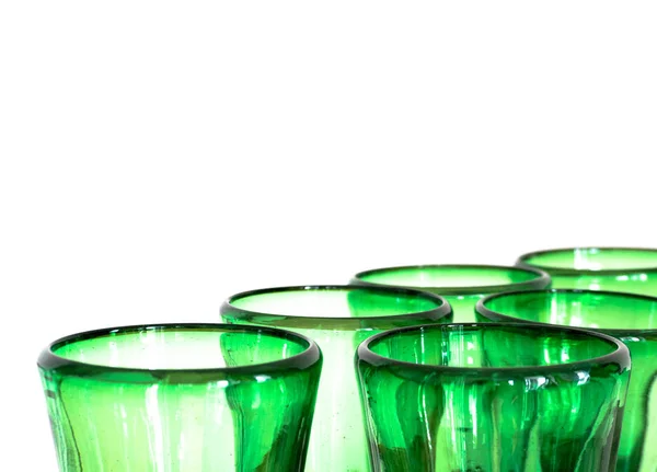 green glass designer wine glasses detail view abstract with copy space horizonal and white background