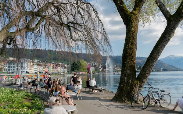 Zug, ZG / Switzerland - 20 April, 2019: many people enjoying a b — Stock Photo, Image