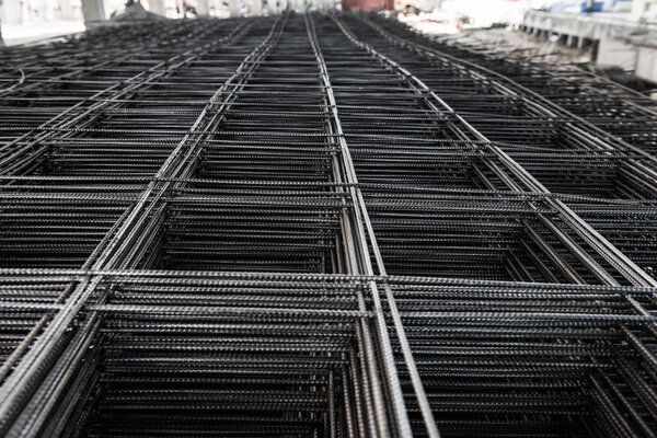 Pile of wire mesh. Reinforcement material of concrete pouring. Depth of field concept. Selection focus to texture of material.