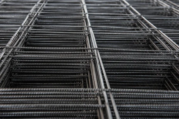 Pile of wire mesh. Reinforcement material of concrete pouring. Depth of field concept. Selection focus to texture of material.