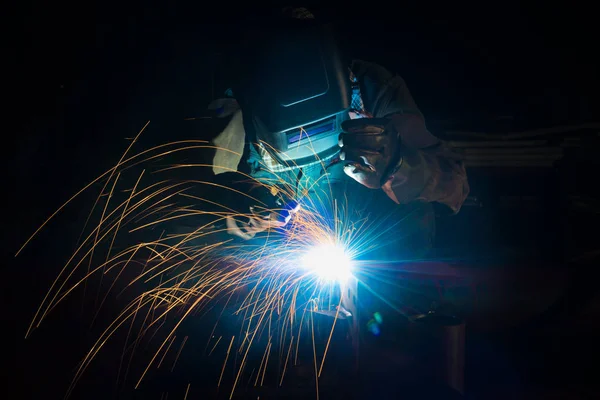 Steel fabrication work in the industrial factory or Welder at the factory welding steel structure preparation for construction work