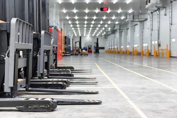 Loading area in the warehouse cold room  with forklift standing