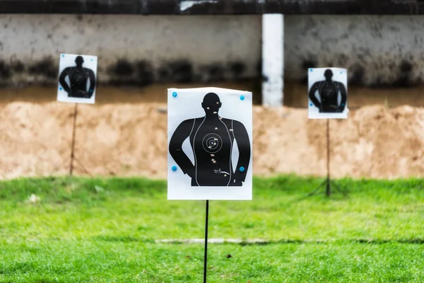 Sight, Targets shoot the gun of people man with bullet holes. Sports practice training.