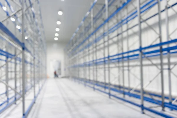 Blur image of New cold room storage for background. Refrigeration and freezing warehouse