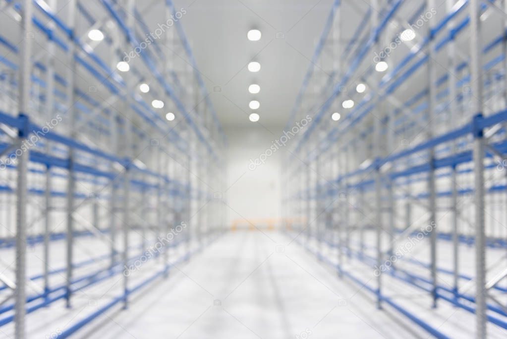 Blur image of New cold room storage for background. Refrigeration and freezing warehouse