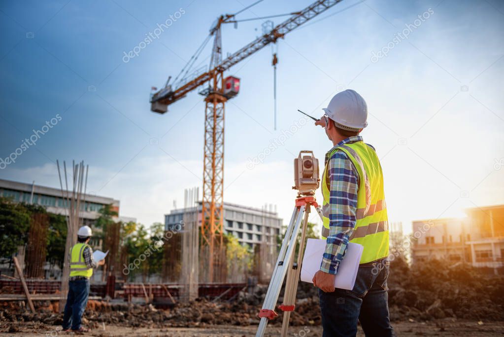 Surveyor equipment. Surveyors telescope at the construction site or Surveying for making contour plans is a graphical representation of the lay of the land startup construction work.