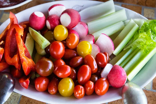 Vegetable Dish. Fresh Vegetable Salad. Cherry Tomatoes.Cucumbers,Sweet Red Pepper, Celery Sticks. Diet Concept. Vegetarian Diet.