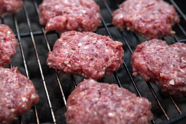 Homemade Hamburgers.Grill Meatballs. Raw Beef Meatballs. Outdoor Picnic.