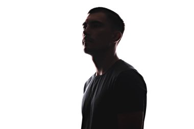 Beyaz arka plan üzerinde izole profiligenç Avrupalı adamın siluet portresi
