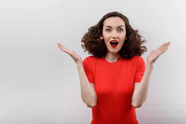 Portrait Surprised Woman Curly Hair Red Shirt Red Lips Raised — Stock Photo, Image