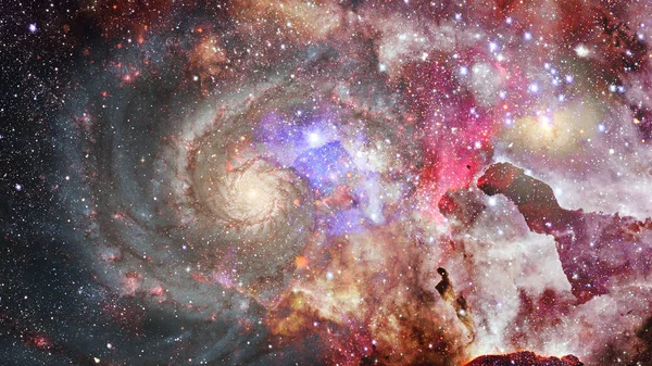 Nebula and galaxies in dark space. Elements of this image furnished by NASA.