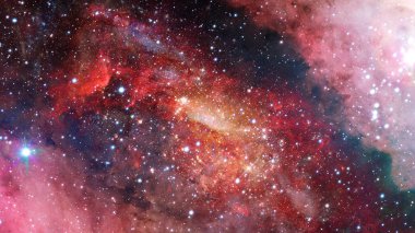 Nebula ve galaksiler uzayda. Bu görüntünün elementleri NASA tarafından desteklenmektedir.
