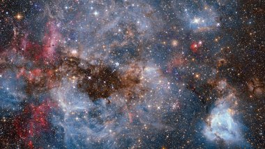 Gezegen ve galaksinin yıldızları serbest uzayda. Bu görüntünün elementleri NASA tarafından desteklenmektedir.