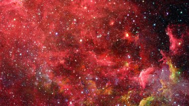 Karanlık uzayda nebula ve galaksiler. Bu görüntünün elementleri NASA tarafından desteklenmektedir.