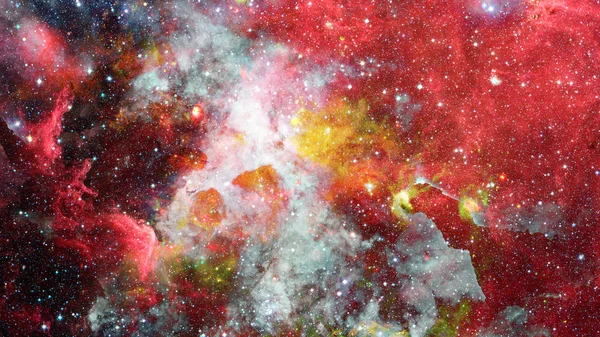 在深空间的恒星场和星云许多光年远远离地球 Nasa 提供的这幅图像的元素 — 图库照片