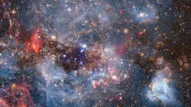 Kozmik gökada Bulutsusu, stardust ve parlak parlayan yıldızlar arka plan. Nasa tarafından döşenmiş bu görüntü unsurları.