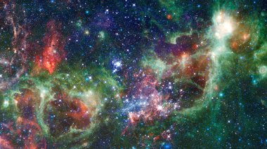 Kozmik gökada Bulutsusu, stardust ve parlak parlayan yıldızlar arka plan. Nasa tarafından döşenmiş bu görüntü unsurları.