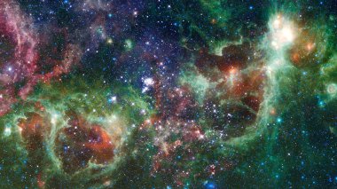 Karanlık nebula ve uzayda yıldızlar. Bu görüntünün elementleri NASA tarafından desteklenmektedir.