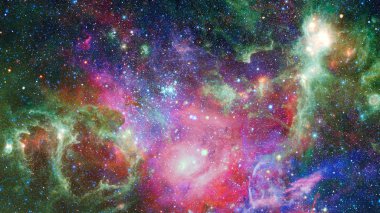 Renkli Bulutsusu ve evrendeki yıldızların açık yıldız kümesi. Nasa tarafından döşenmiş bu görüntü unsurları.