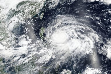Süper tayfun Mangkhut (yerel olarak Ompong olarak da bilinir) taşıyan aşağı Filipinler üzerinde. Nasa tarafından döşenmiş bu görüntü unsurları