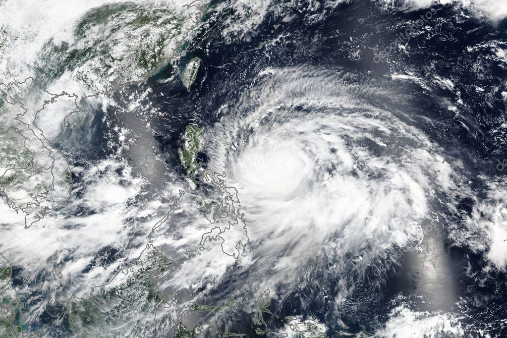 Super Typhoon Mangkhut (known locally as Ompong) Bearing Down on The Philippines. Elements of this image furnished by NASA