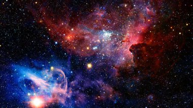 Uzay boşluğunda yıldızlar ve galaksilerin olduğu evren sahnesi. Bu görüntünün elementleri NASA tarafından desteklenmektedir