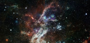 Derin uzayda spiral nebula ve ışık ışını. Bu görüntünün elementleri NASA tarafından desteklenmektedir.