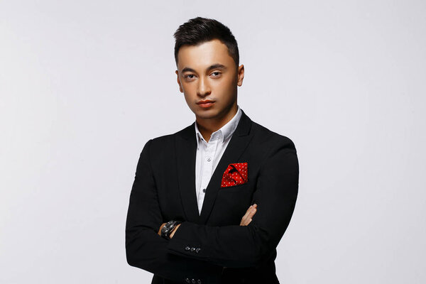 man in formal wear posing isolated on white background