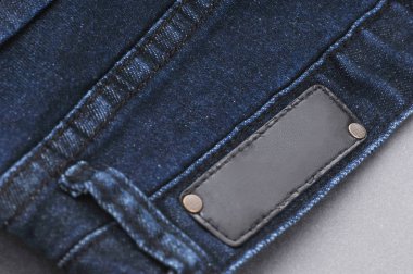 arka cepler ve etiket, yakın çekim ile parçası denim pantolon