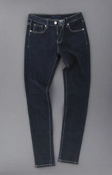 Fashionable Denim Pants Grey Background Top View — Stock Photo, Image