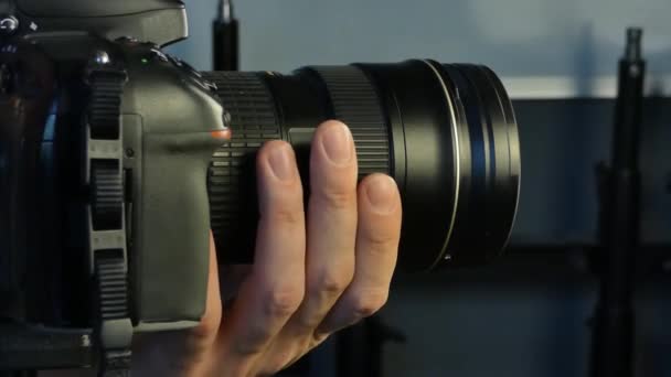 Photographer Studio Working Camera Adjusting Lens Profile View Close — Stock Video
