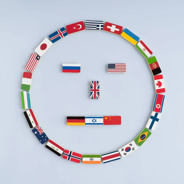 Ilustracja Uśmiechniętą Twarz Flagi Narodowe Domino Koncepcja Pokoju Wspólnoty Narodów — Zdjęcie stockowe