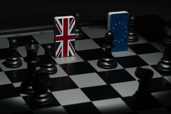 Schackbräde med flaggor av länder — Stockfoto