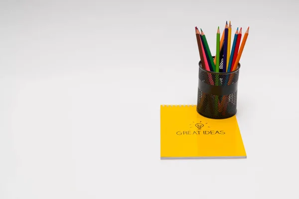 Notepad and color pencils — Stock Photo, Image