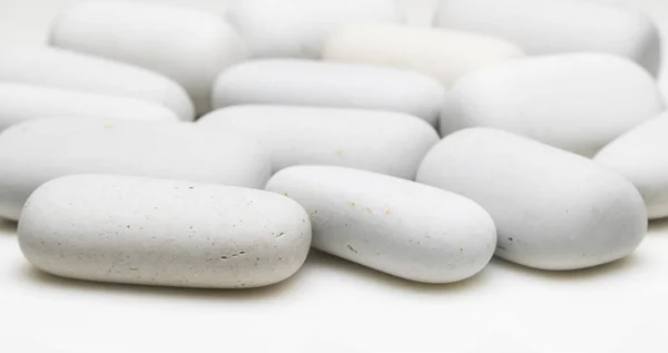 stock image rounded white stones