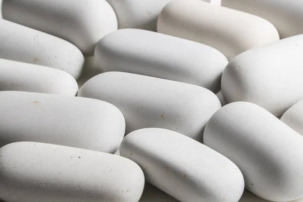 Rounded white stones — Stock Photo, Image