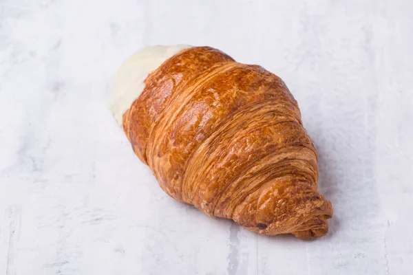 Croissant Cream Filling Light Background — Stock Photo, Image