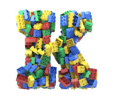 Beyaz arkaplanda oyuncak renkli plastik bloklar yazı tipi.