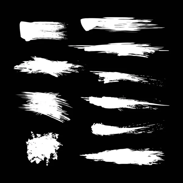 Weiße Pinsel-Spuren-Texturfarbe auf schwarz gesetzt. Vektor — Stockvektor