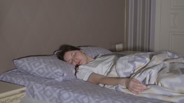 Young woman having a nightmare. Restless dreams — Stock Video