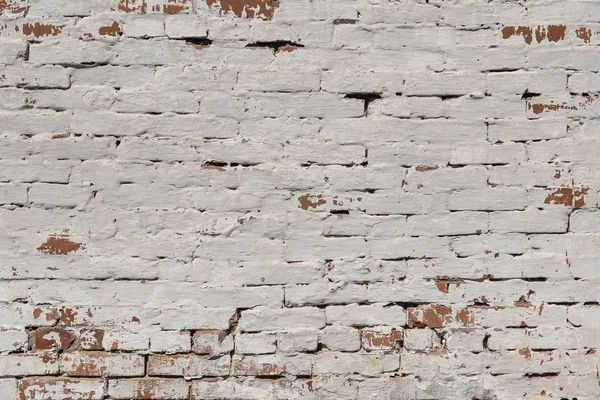 Lekeli eski koyu kahverengi ve kırmızı tuğla duvar arka plan dokusu yıpranmış.