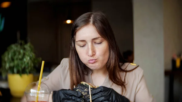 Pretty Girl Black Gloves Eating Hamburger Cafe — Stock Photo, Image