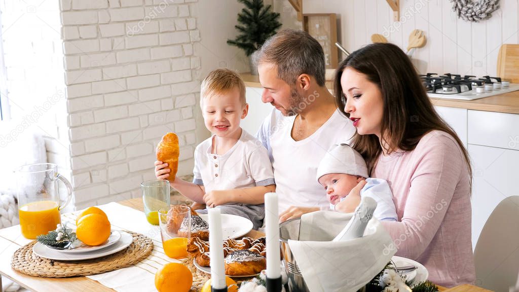 Cheerful family having breakfast together