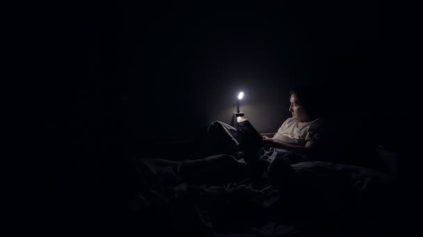 Young Woman Reading Book Bed Night Home — Stock Video