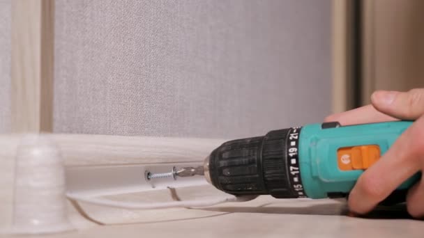 Man drilling screws into plank — Stock Footage Man drilling screws into plank Royalty Free Stock Video