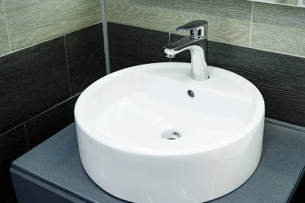 Bathroom interior with circle sink and faucet — Stock Photo, Image