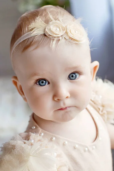 Portrait of the lovely little girl with blue eyes. Serious quiet — Stock Photo, Image