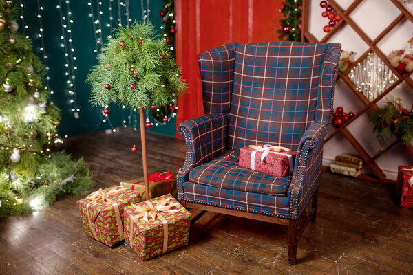 Christmas decor. Bright interior with Christmas tree, large conv