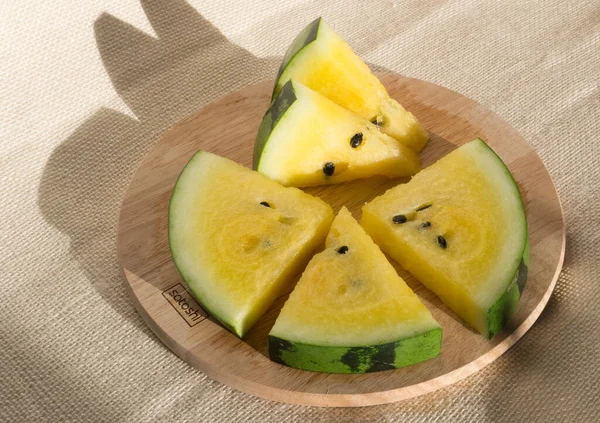 Yellow watermelon cut into wedges for the watermelon diet