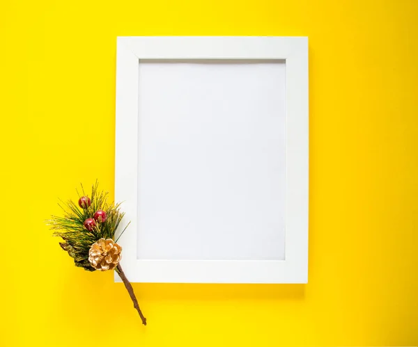 Holiday photo frame on isolated yellow background